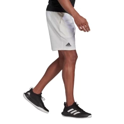 Adidas Men's Club Stretch Woven 7-Inch Shorts (White/Black) -Tennis Equipment Store GH7222 APP on model walking white