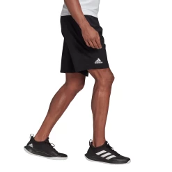 Adidas Men's Club Stretch Woven 7-Inch Shorts (Black/White) -Tennis Equipment Store GL5409 APP on model walking white c6927ead fdd9 4671 a841 3fcc6f756531